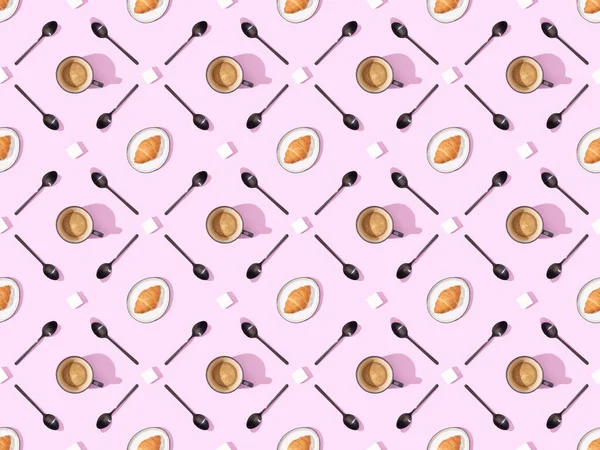 Top view of spoons, sugar, croissants on plates and coffee on pink, seamless background pattern — Stock Photo