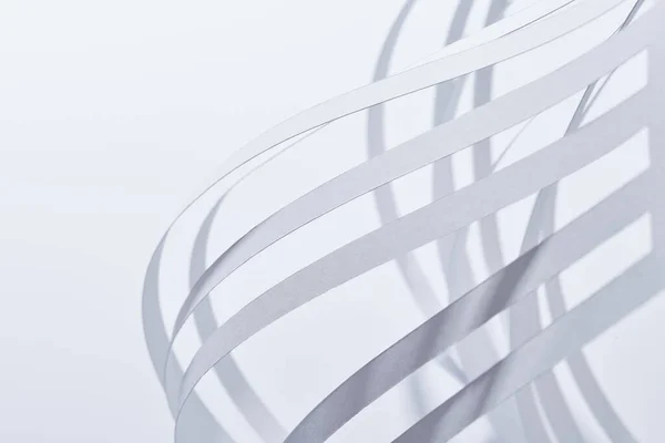 Close up view of paper stripes on white background — Stock Photo