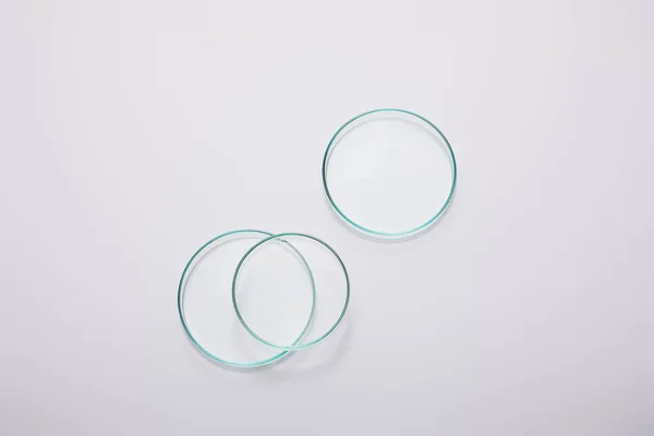 Top view of laboratory glassware on grey background — Stock Photo