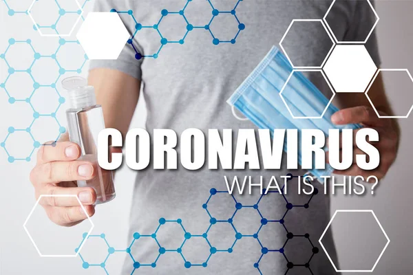 Cropped view of man holding gel hand sanitizer in bottle and medical mask on grey background, coronavirus illustration — Stock Photo