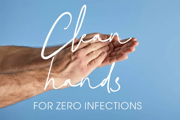 Vista recortada del hombre lavándose las manos aisladas en azul, manos limpias para cero infecciones ilustración - foto de stock