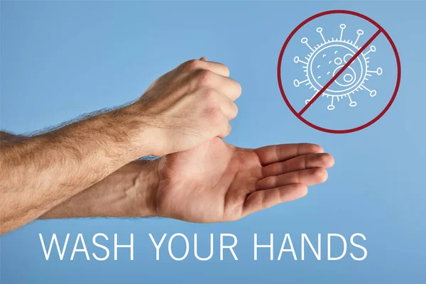 Partial view of man washing hands isolated on blue, wash your hands illustration — Stock Photo