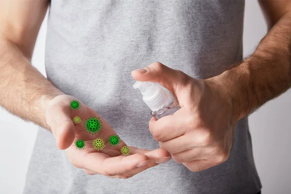 Visão cortada do homem adulto usando higienizador de mão em frasco dispensador, ilustração de bactérias — Fotografia de Stock