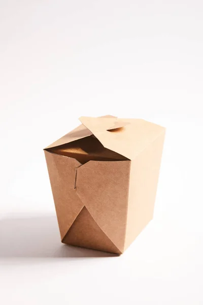 Cardboard takeaway box with chinese food on white — Stock Photo