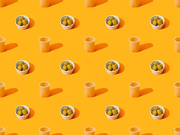 Cannelloni and olives on orange colorful background, seamless pattern — Stock Photo