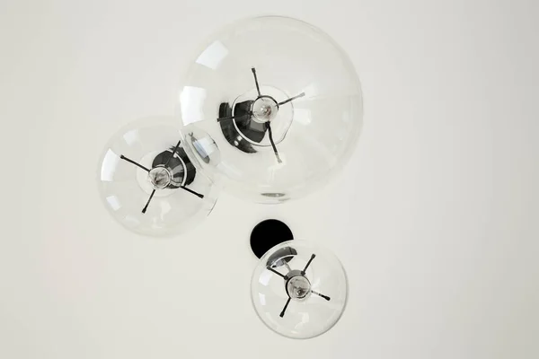 Bottom view of light bulbs on ceiling — Stock Photo