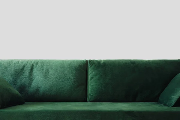 Close up view of modern green sofa with pillows in room — Stock Photo