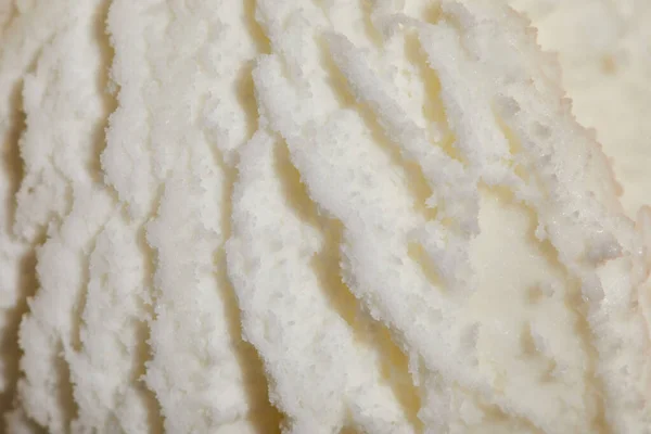 Close up view of fresh white tasty textured ice cream ball — Stock Photo