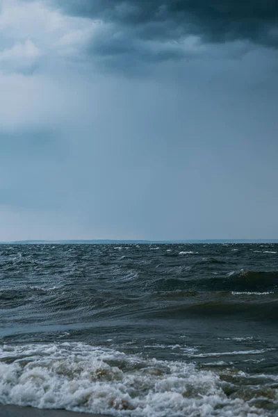 Big ocean wave breaking the shore