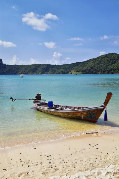 Island, Ocean views near Phuket Thailand with Blues, Turquoise and Greens oceans, mountains, boats, caves, trees resort island of phuket Thailand. Including Phi Phi, Ko Rang Yai, Ko Li Pe and other islands. Asia.