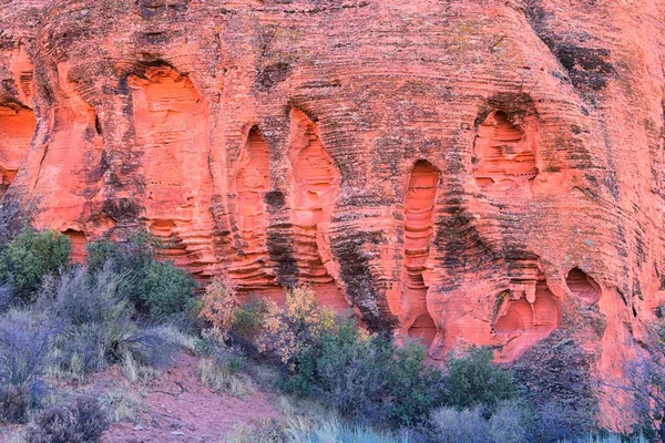 Red and Orange Sandstone Rock Formations along the Bone Wash Elephant Arch Trail in Red Cliffs National Desert Reserve in Saint George, Utah. United States.