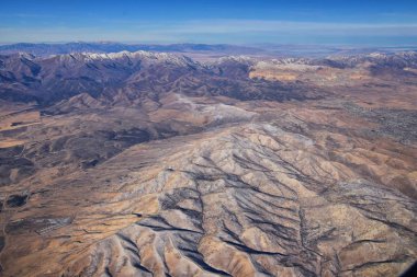 Rocky Mountains, Oquirrh range aerial views, Wasatch Front Rock from airplane. South Jordan, West Valley, Magna and Herriman, by the Great Salt Lake Utah. United States of America. USA. clipart