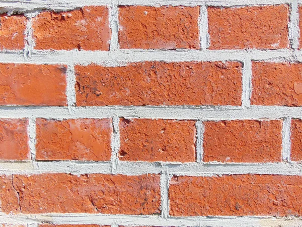 レンガ色の壁 不均一なテクスチャ レンガのテクスチャ背景 — ストック写真