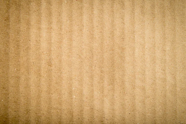 Textur bakgrund randig brun kartong, vinjettering — Stockfoto
