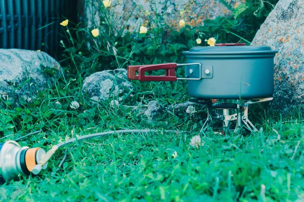 Gaz yakıcı ve Melon şapkası dağ yürüyüşe pişirme