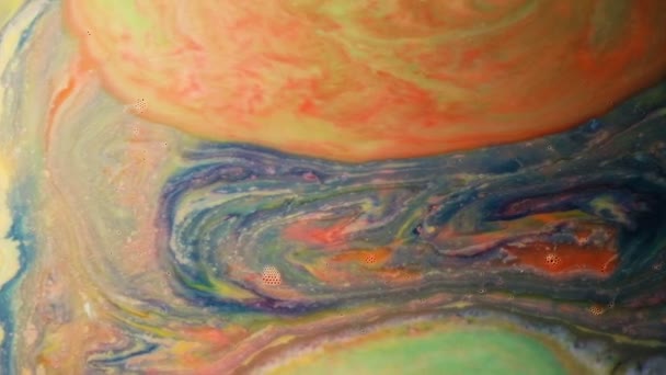 Abstract psychedelic background. Narrowing of multicolored paints in milk — Stock Video