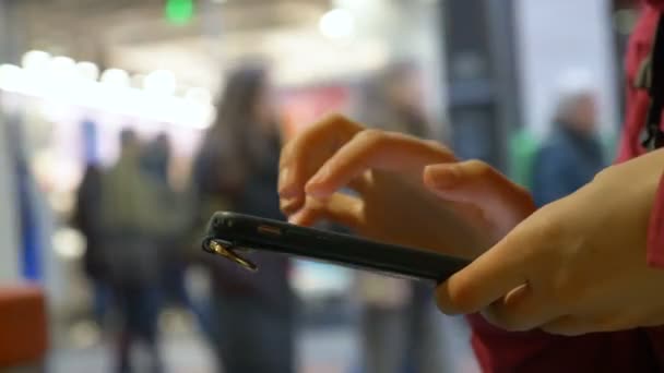 Woman hands hold black smartphone swipe and tap screen — Stock Video