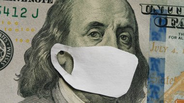 Koronovirüs enfeksiyonu covid-19 salgını. 100 dolarlık maske Benjamin Franklin, dünya ekonomik krizi.