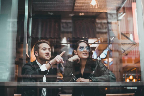 Couple in a cafe having a good time. Couple in love in a cafe.