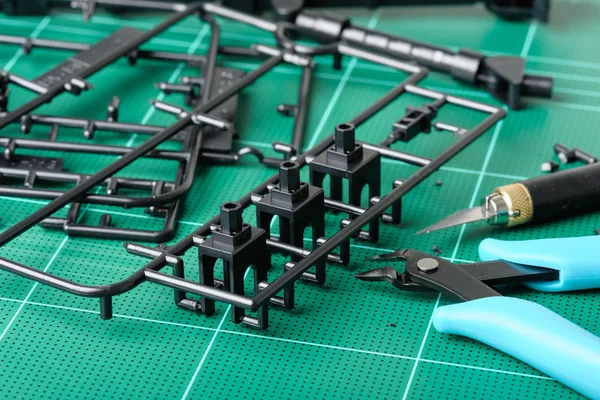 Black plastic sprue — Stock Photo, Image