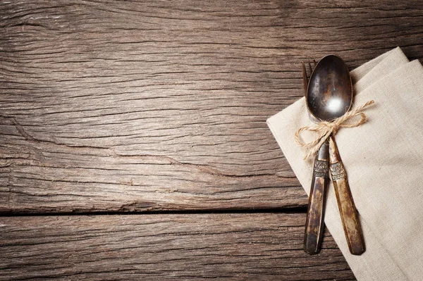 Old brass spoon and fork — Stock Photo, Image