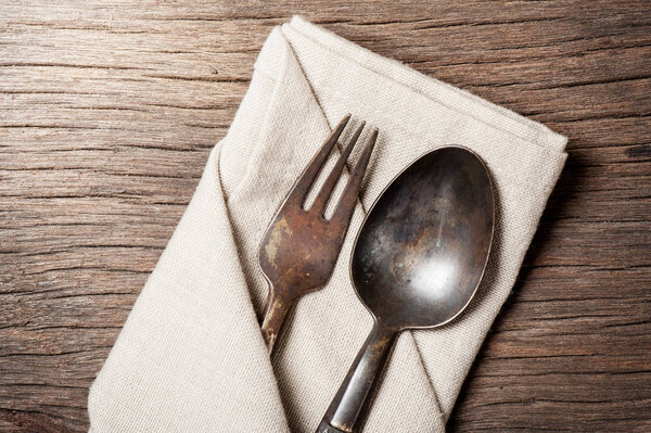 old brass spoon and fork