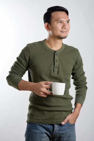 Muž a hrnek na kávu — Stock fotografie