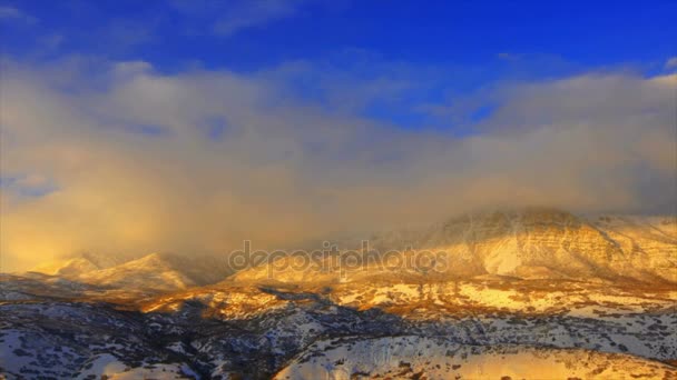 Time lapse clouds with sunset on mountain — Stock Video