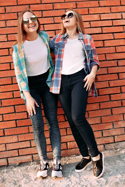 Young girls in shirts on the street — Stock Photo, Image