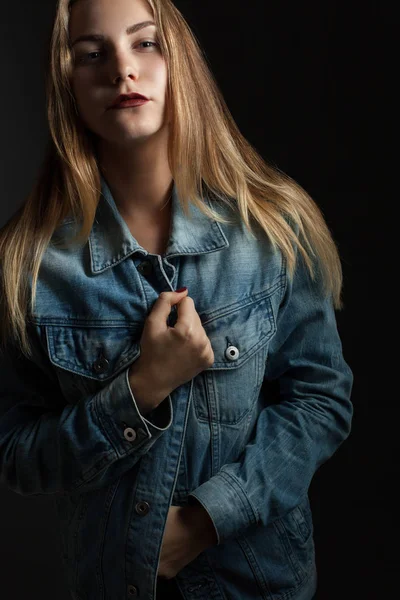 Woman in denim jacket