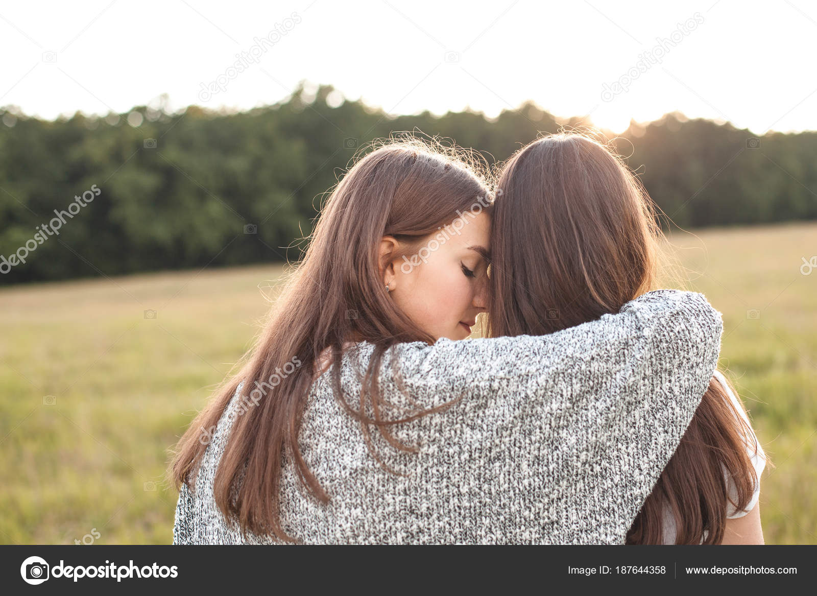 two girls hugging