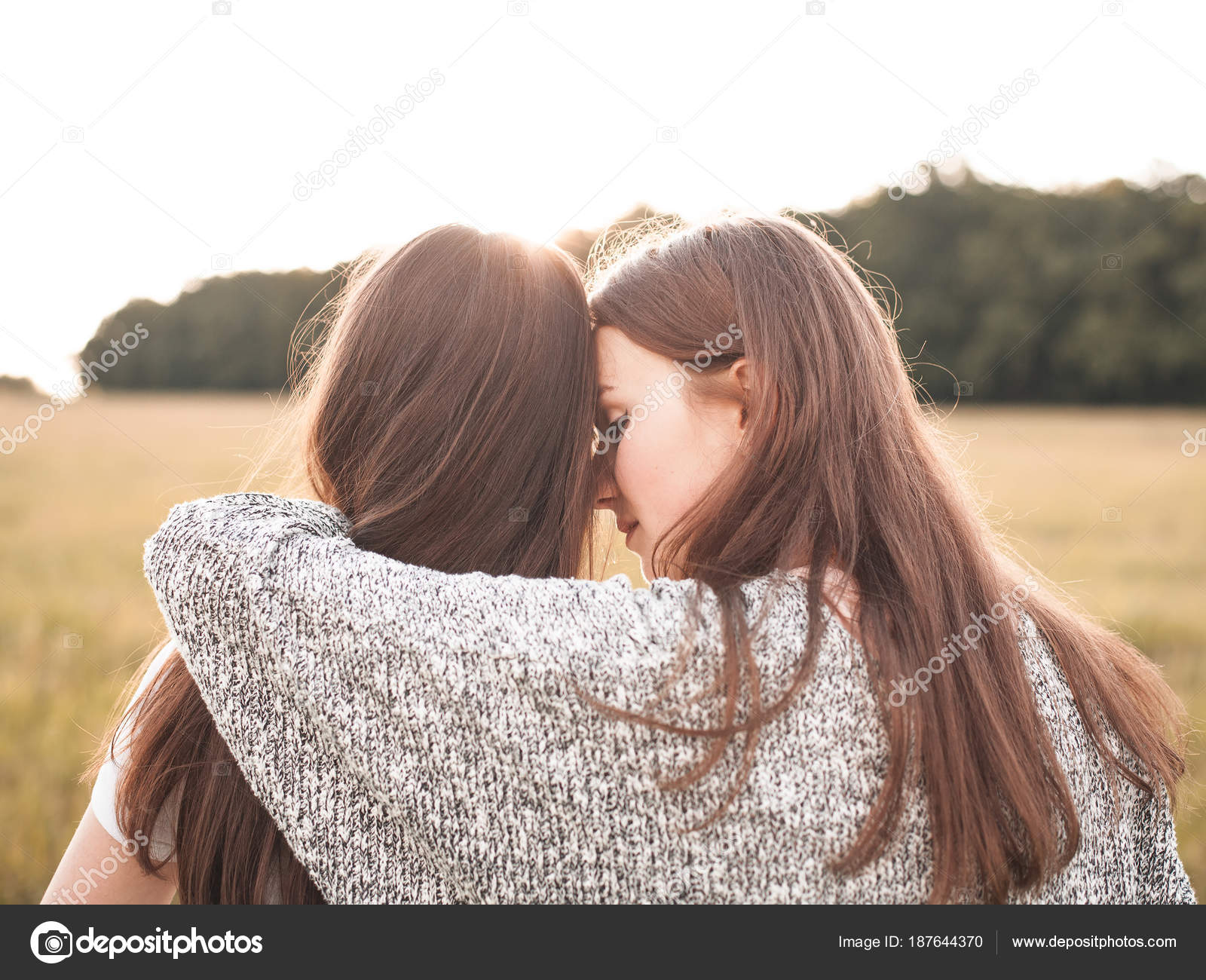 two girls hugging