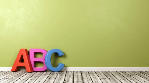Testo ABC su pavimento in legno contro parete — Foto Stock