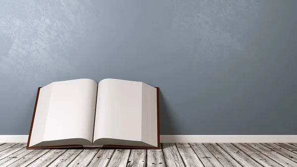 Open boek op houten vloer tegen muur — Stockfoto