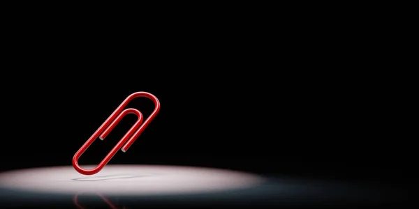 One Red Paperclip Spotlighted on Black Background — 스톡 사진