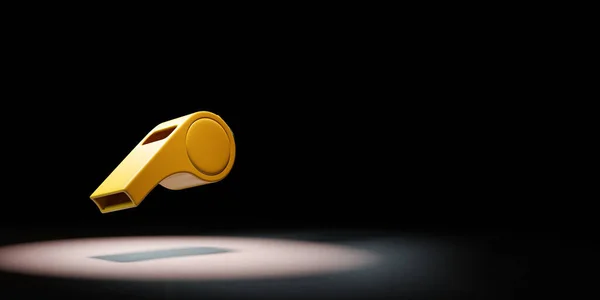 One Yellow Plastic Whistle Spotlighted on Black Background — 图库照片