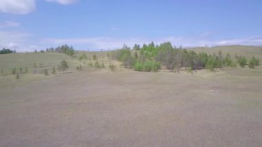 ProRes. Baykal göl kıyısı ve havadan görünümü kayalardan. Manzara.