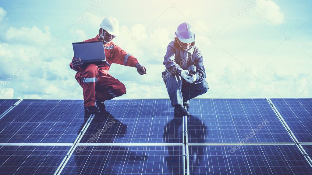 engineers operating and check generating power of solar power pl