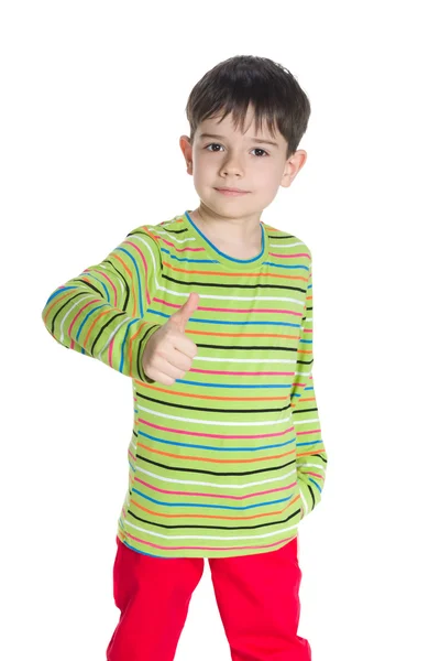 Handsome little boy with his thumb up — Stock Photo, Image