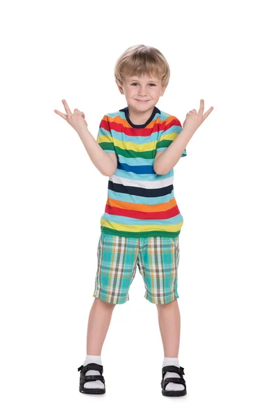 Cute little boy stands — Stock Photo, Image