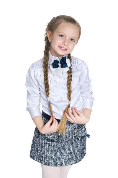 Молодая девушка с косичками — стоковое фото