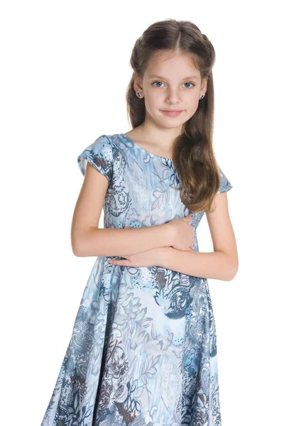 Cute little girl stands against the white — Stock Photo, Image