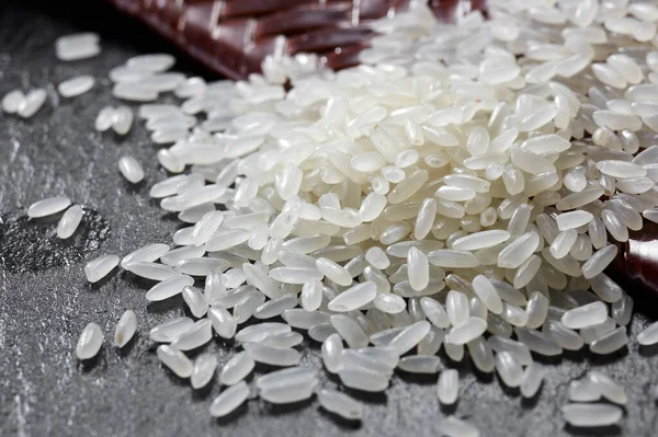 Closeup Rice Black Stone Background — Stock Photo, Image