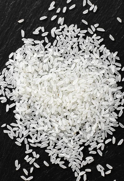 Closeup Rice Black Stone Background — Stock Photo, Image