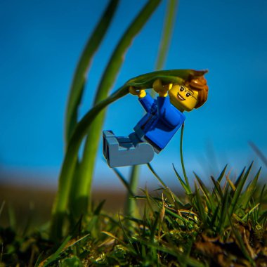 Donegal, Ireland - 26th March 2017: Lego minifig hanging onto a  clipart