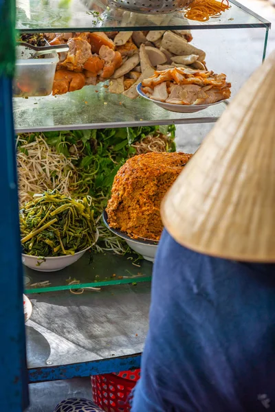 Typical Vietnamese street food stall and ingredients for noodle soup