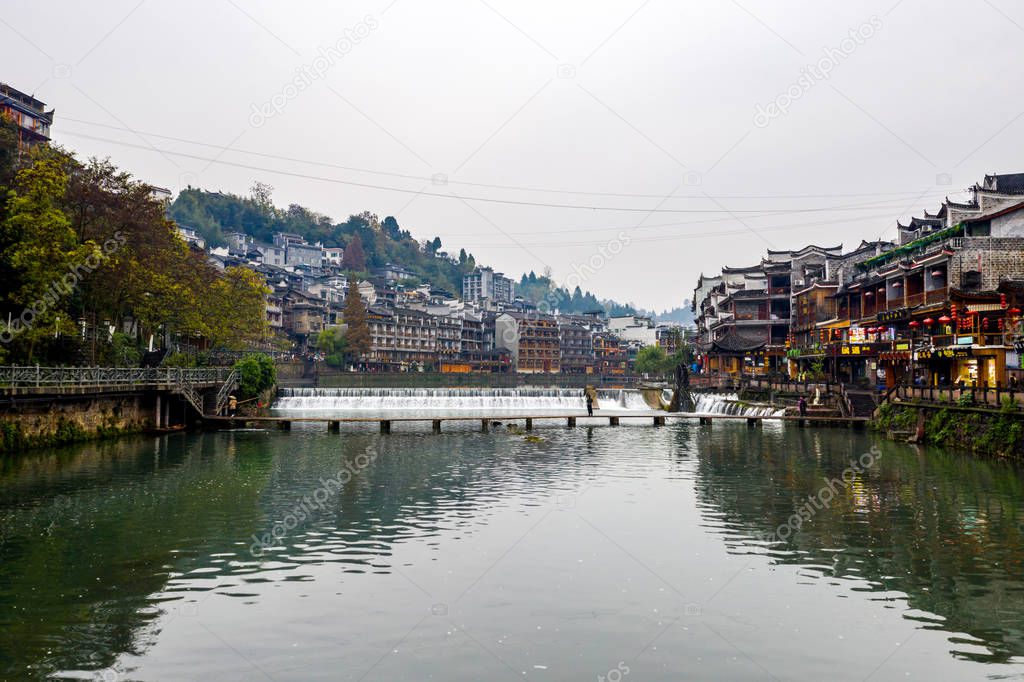 Wide view of Fenghuang ancient town on beautiful Tuojiang river