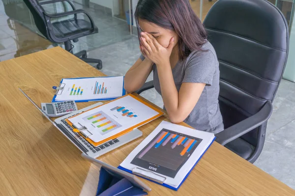 Young employee feel tired and frustrated in office