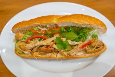 Vietnam Chicken meat sandwich and chili pepper- Banh Mi clipart