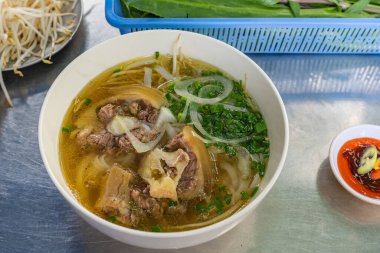 Pho beef noodle soup - local famous Vietnamese cuisine